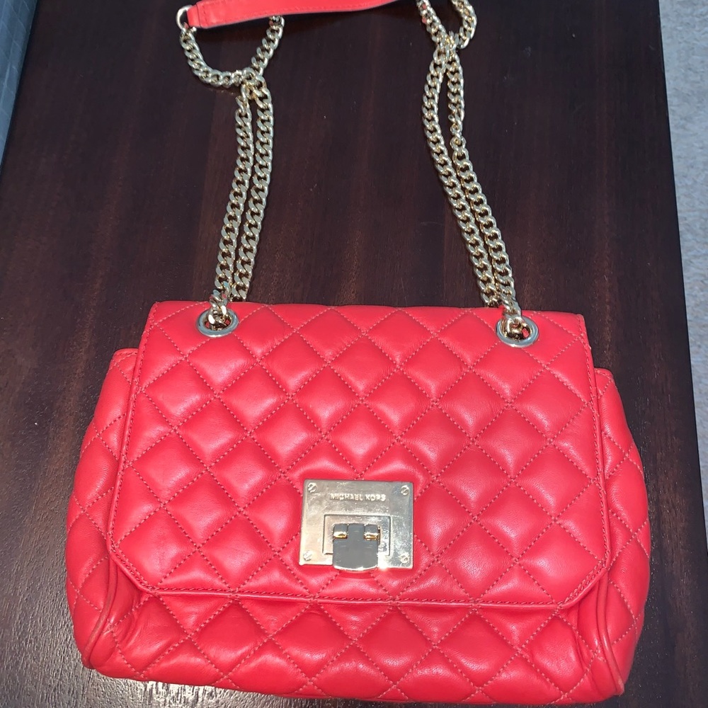 Micheal kors orange crossbody/ shoulder bag.